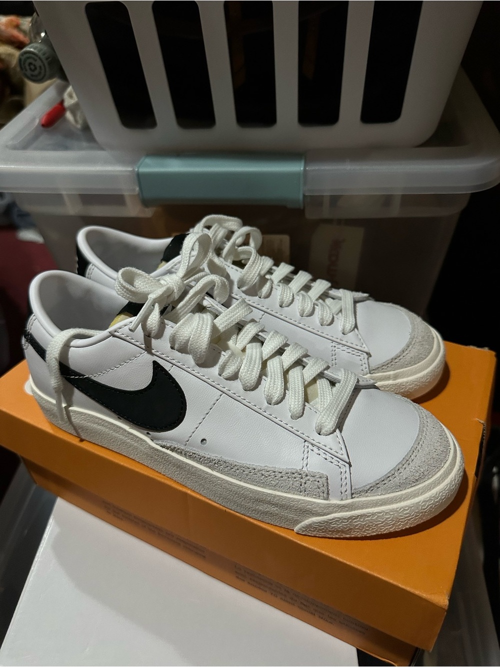 Nike Women’s White Leather Sneakers with Black Swoosh
